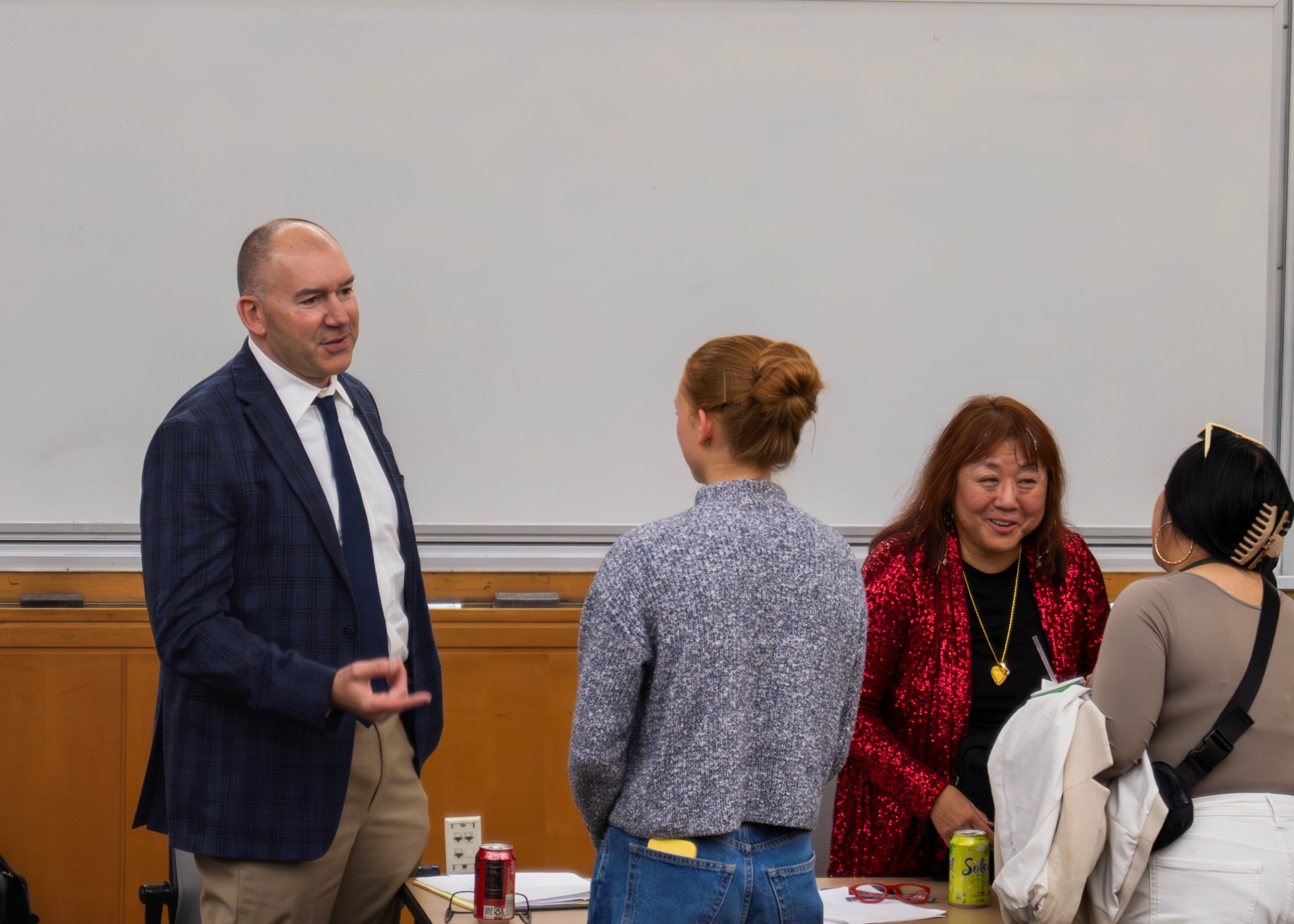 John Marandas and Peggy Nagae talking to students.
